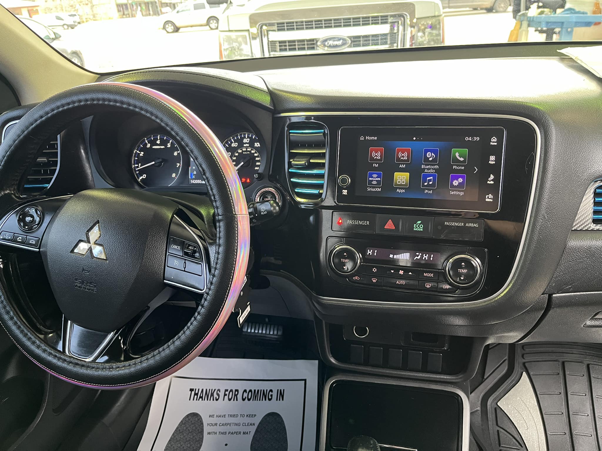 Clean dashboard and center console after interior car detailing in Dublin, TX