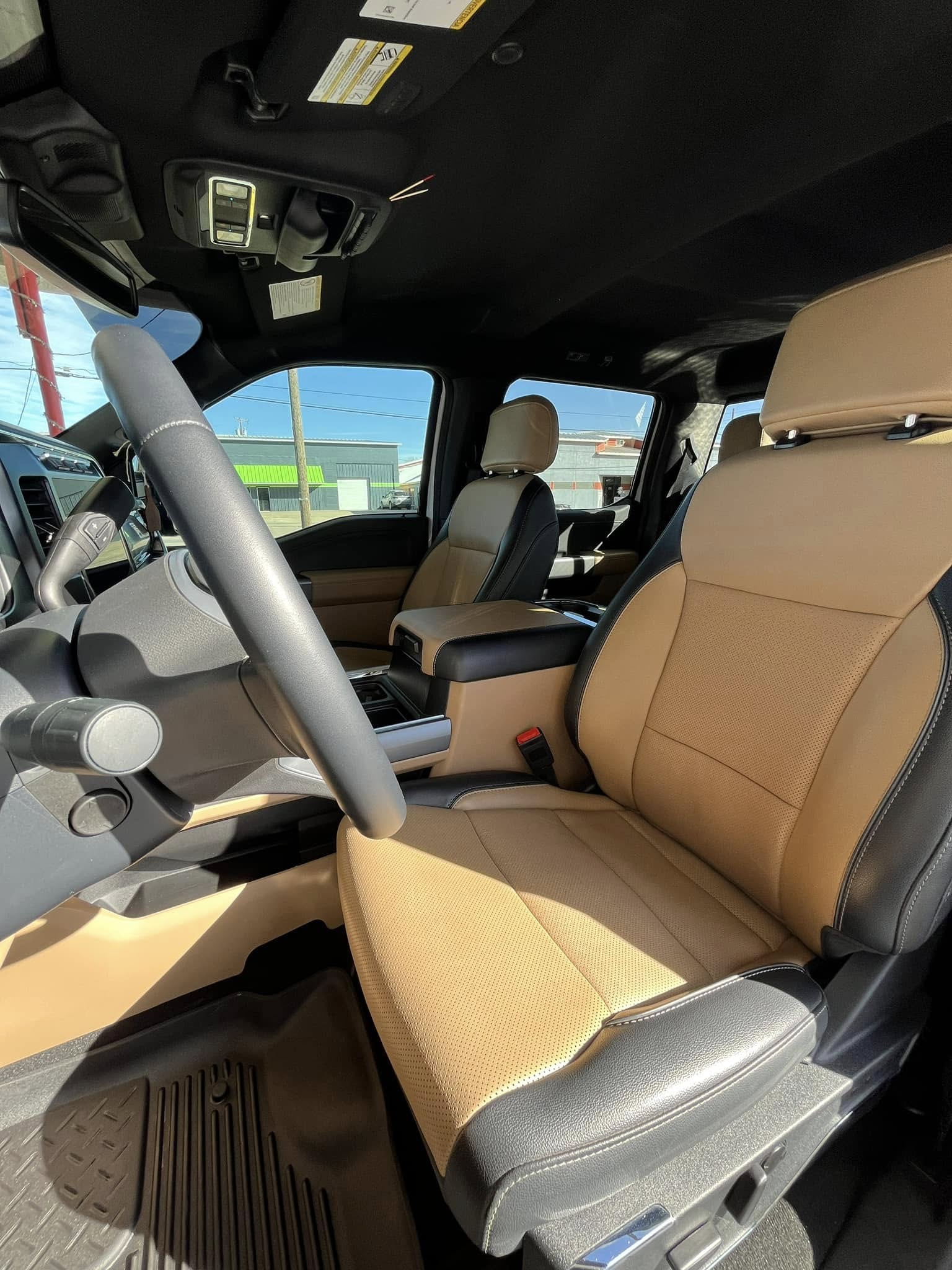 Conditioned leather truck seats after interior detailing at Texas Car Detail in Dublin, TX